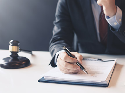 businessman-or-lawyer-discuss-deals-and-sign-contr-N5VAW9M