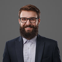 cheerful-bearded-man-in-glasses-8SR89EE.jpg